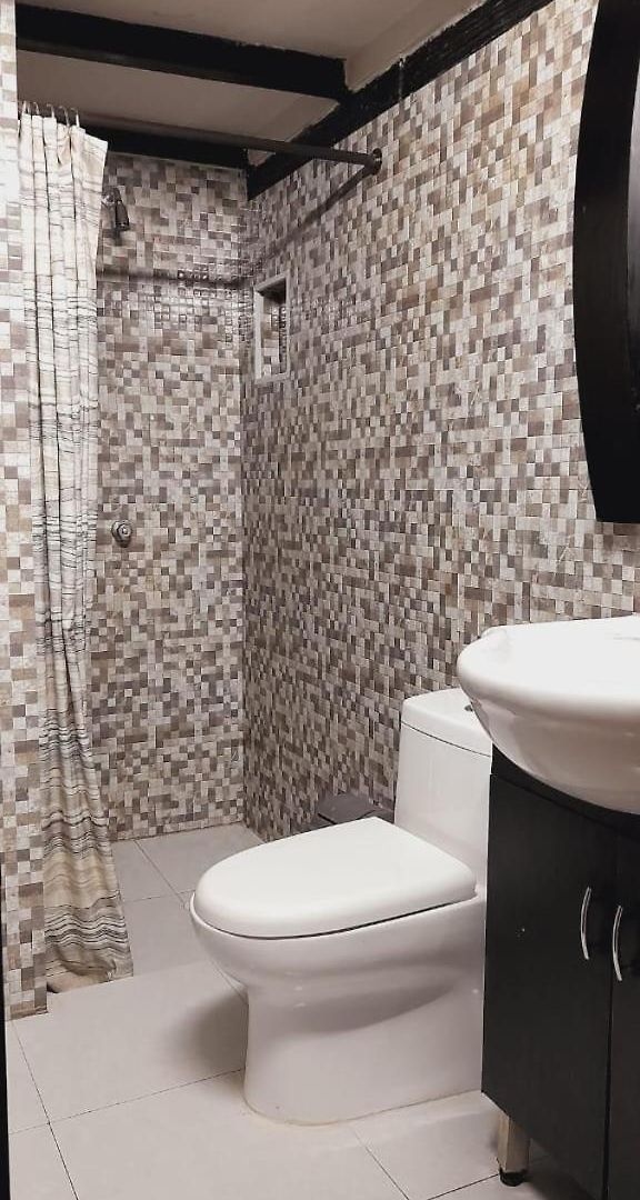 Habitación Con Baño Privado En El Corazón De Manga Habitación en casa particular *