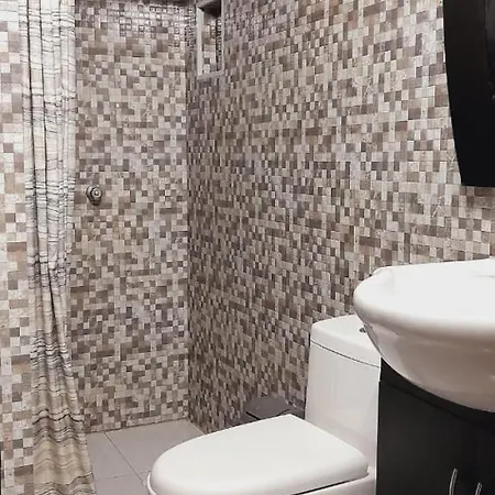 Habitación Con Baño Privado En El Corazón De Manga Habitación en casa particular *